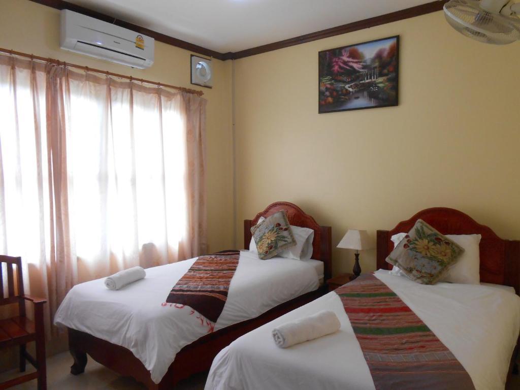 Khampaseuth Hotel Vang Vieng Habitación foto