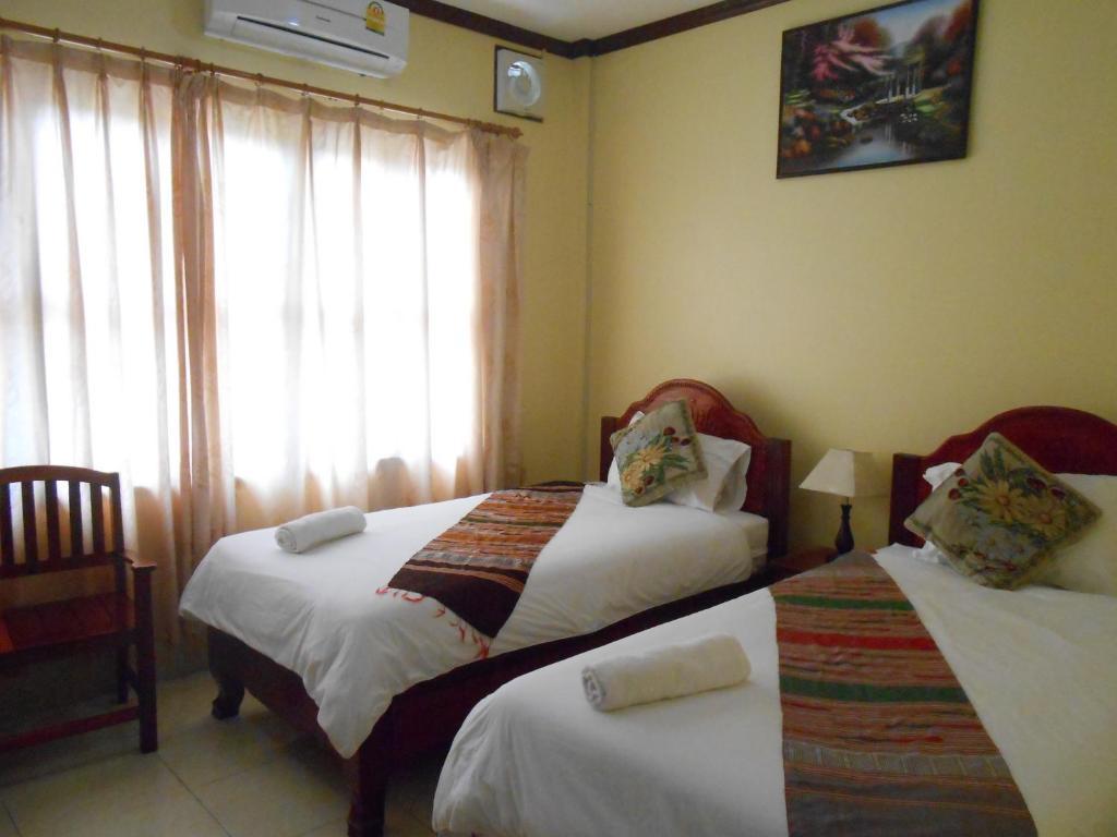 Khampaseuth Hotel Vang Vieng Habitación foto